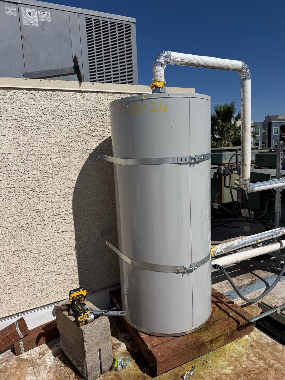 New commercial water heater installed on a rooftop