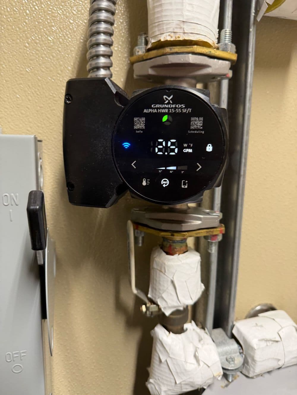 Hot water recirculation pump installed on a supply line